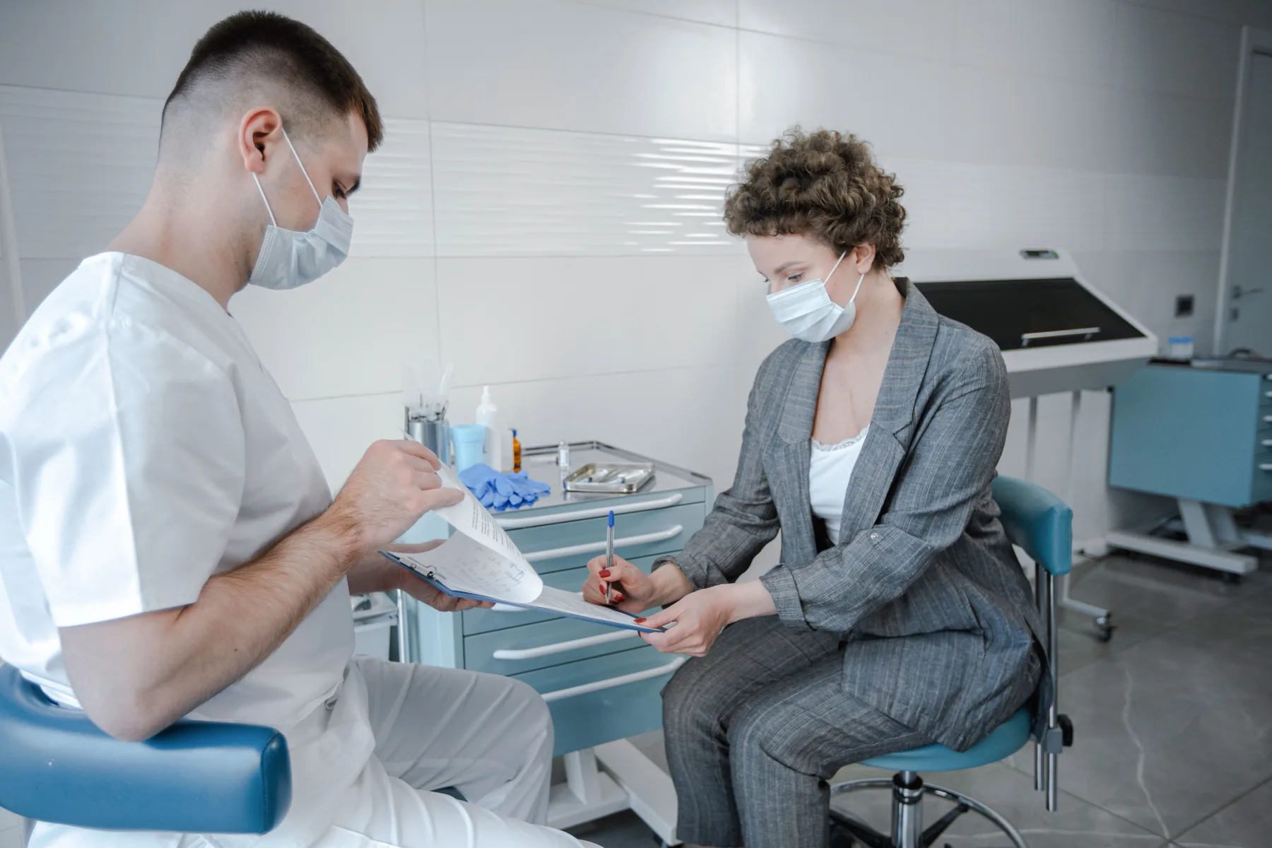 dentist talking with patien
